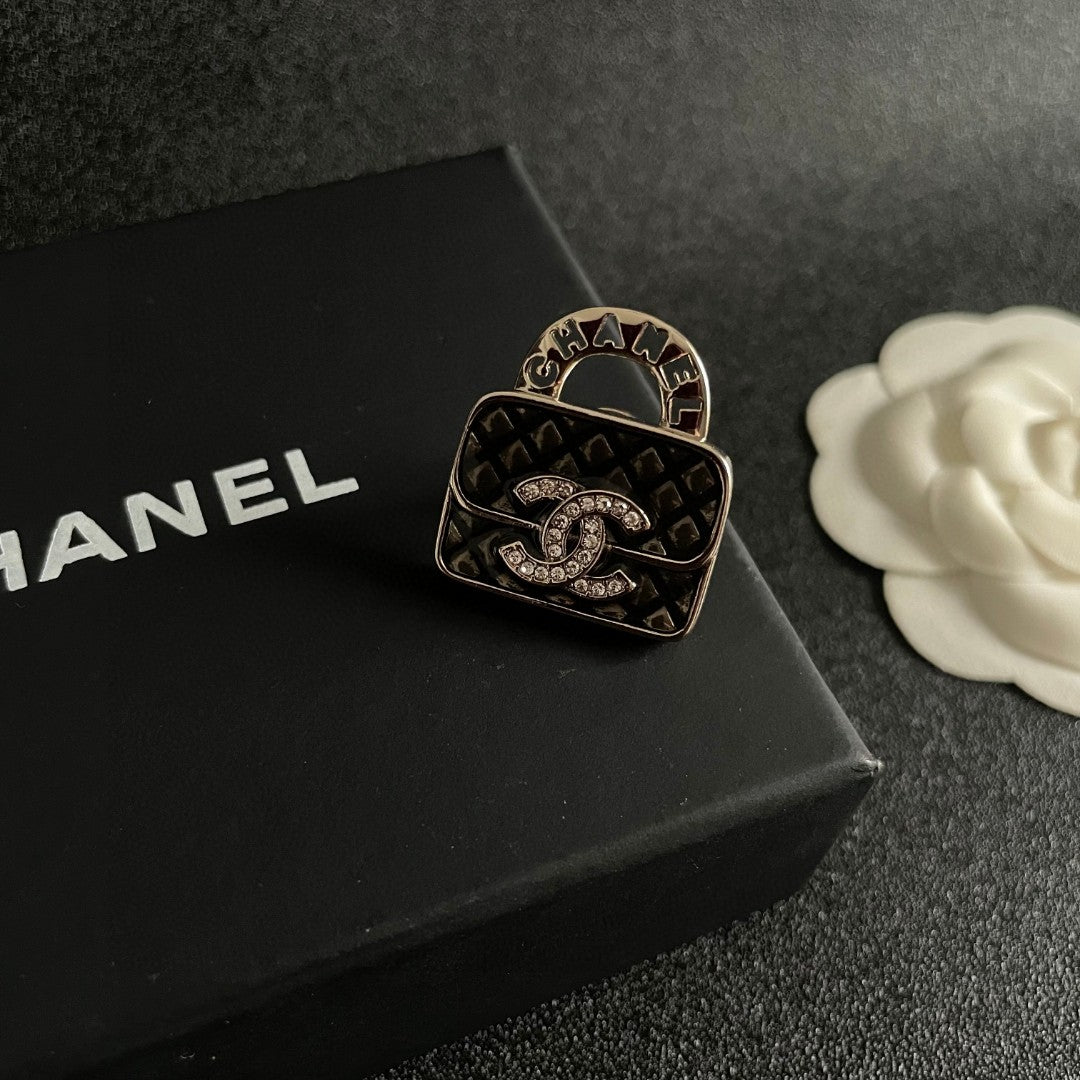 Double-C Emblem Brooch in Polished Metal-Tone – Design 069 detail view