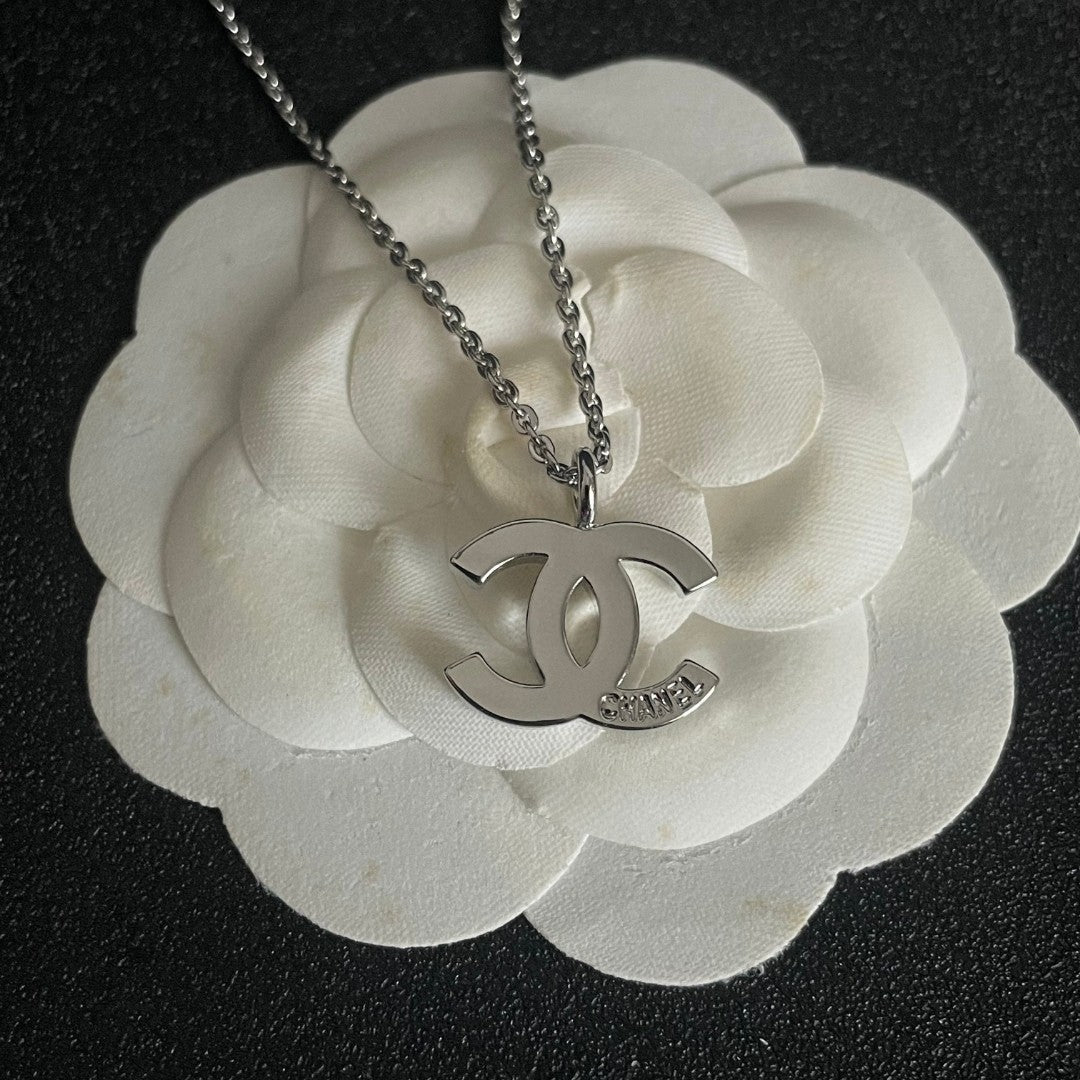 Double-C Emblem Pendant Necklace in Polished Metal-Tone – Design 057 front product view
