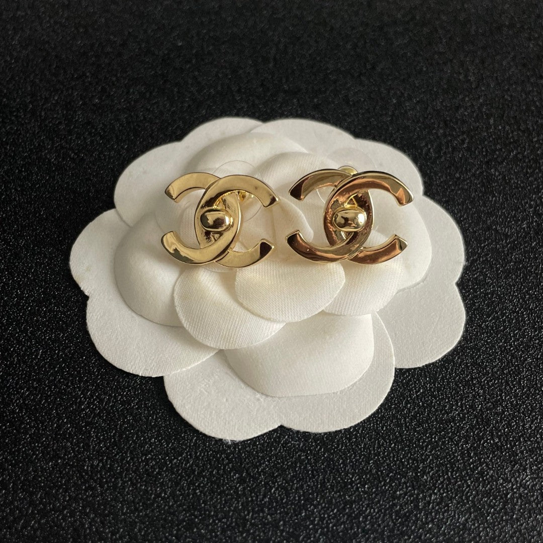 Double-C Emblem Stud Earrings in Polished Metal-Tone – Design 349 front product view