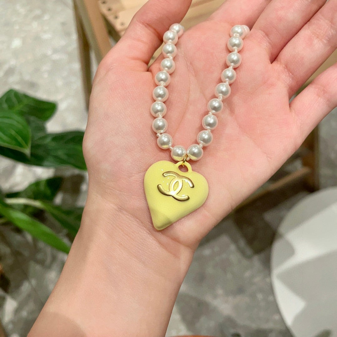 Double-C Emblem Pearl-Detail Pendant Necklace – Pearl Detail – Design 106 side detail