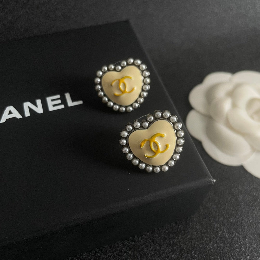 Double-C Emblem Pearl-Detail Stud Earrings – Pearl Detail – Design 019 detail view