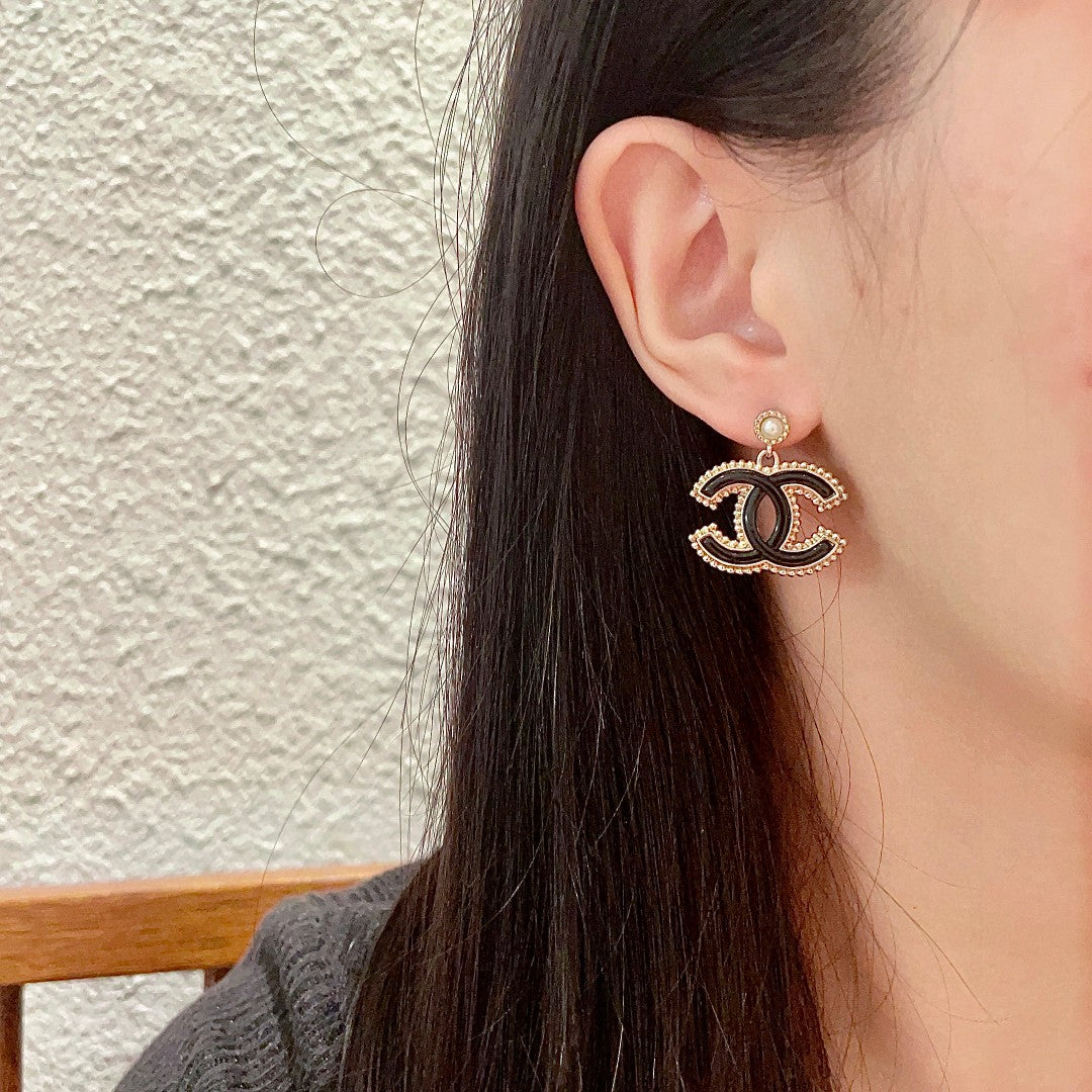 Double-C Emblem Pearl-Detail Statement Earrings – Pearl Detail – Design 022 detail view