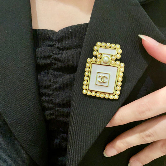 Double-C Emblem Brooch in Polished Metal-Tone – Pearl Detail – Design 007 main product view