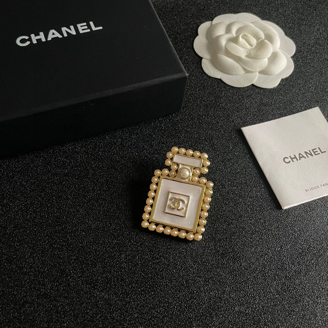 Double-C Emblem Brooch in Polished Metal-Tone – Pearl Detail – Design 007 styled product view