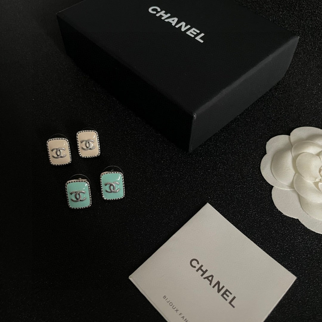 Double-C Emblem Stud Earrings in Polished Metal-Tone – Design 307 close-up detail