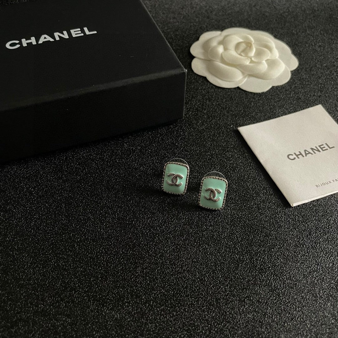 Double-C Emblem Stud Earrings in Polished Metal-Tone – Design 307 styled product view
