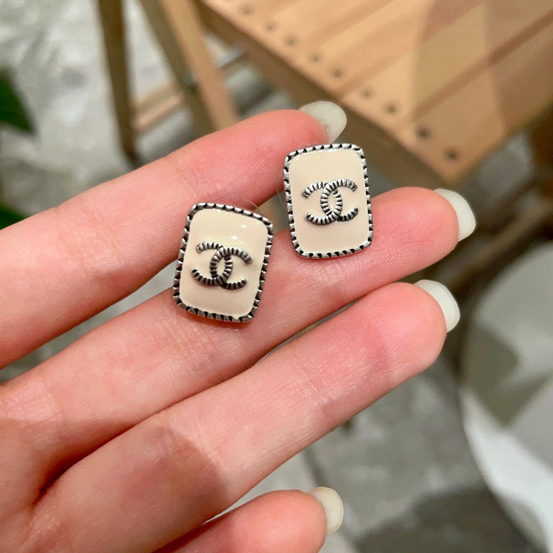 Double-C Emblem Stud Earrings in Polished Metal-Tone – Design 308 side detail