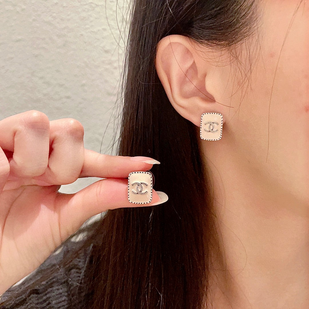 Double-C Emblem Stud Earrings in Polished Metal-Tone – Design 308 main product view