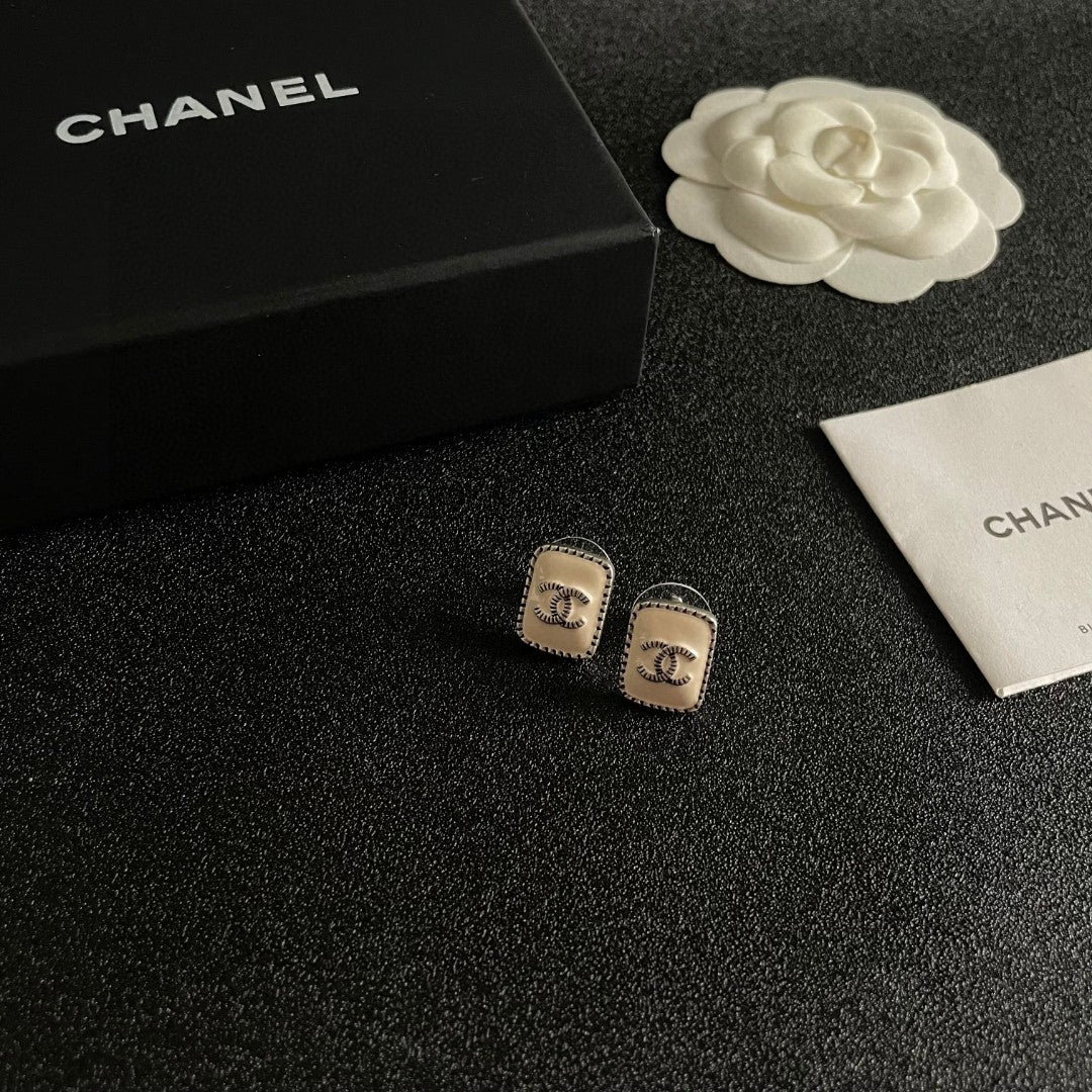 Double-C Emblem Stud Earrings in Polished Metal-Tone – Design 308 styled product view