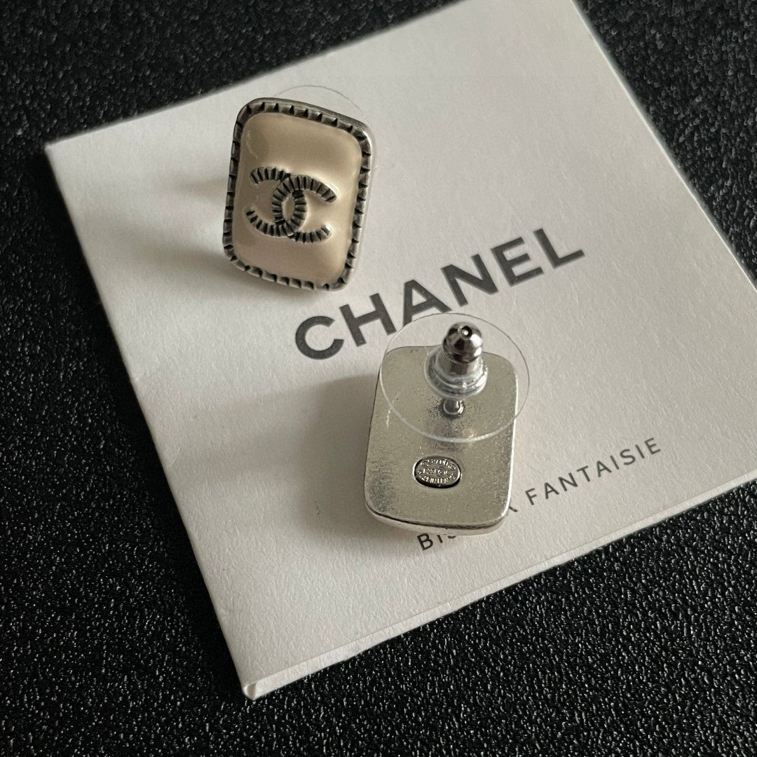 Double-C Emblem Stud Earrings in Polished Metal-Tone – Design 308 main product view