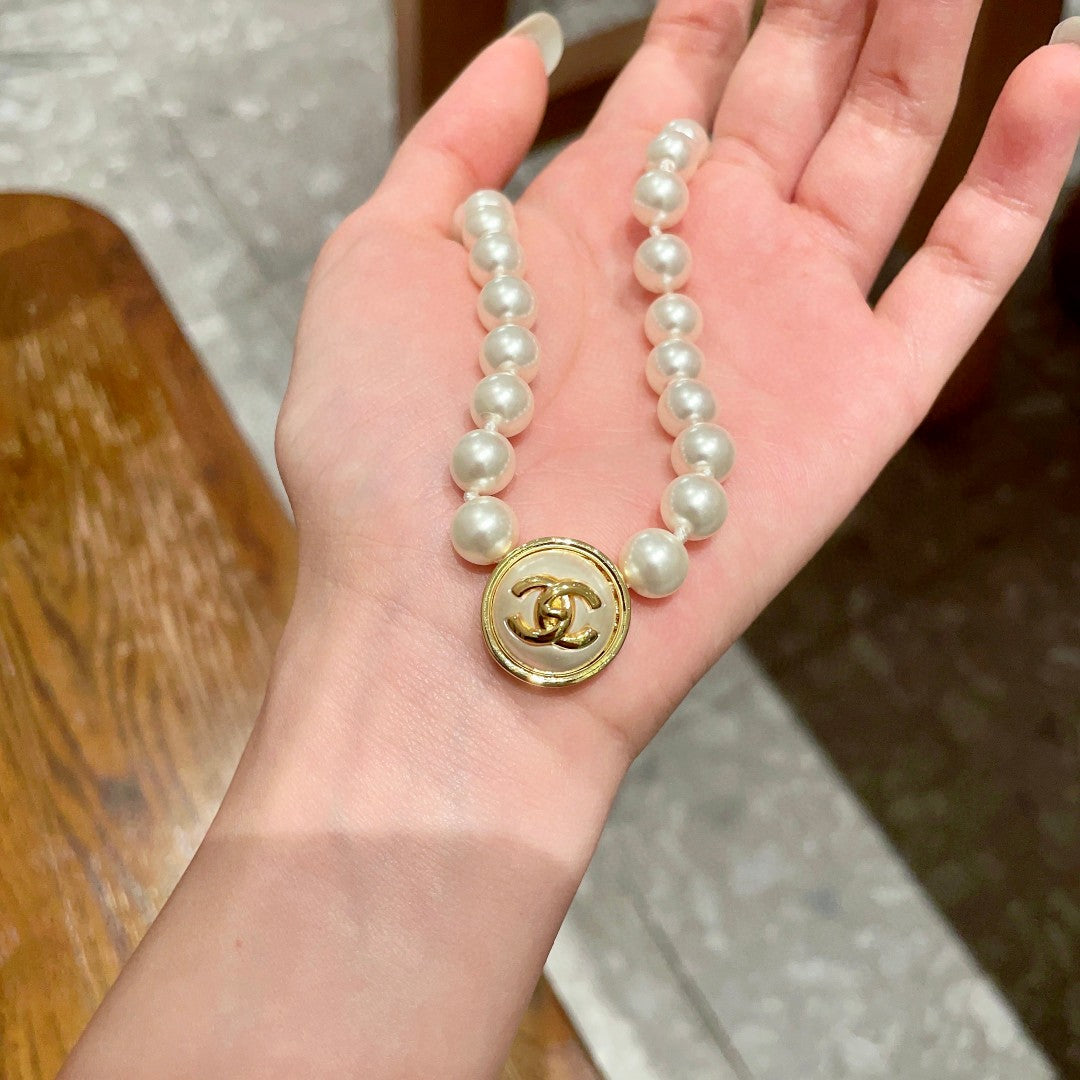Double-C Emblem Pearl-Detail Pendant Necklace – Pearl Detail – Design 076 close-up detail