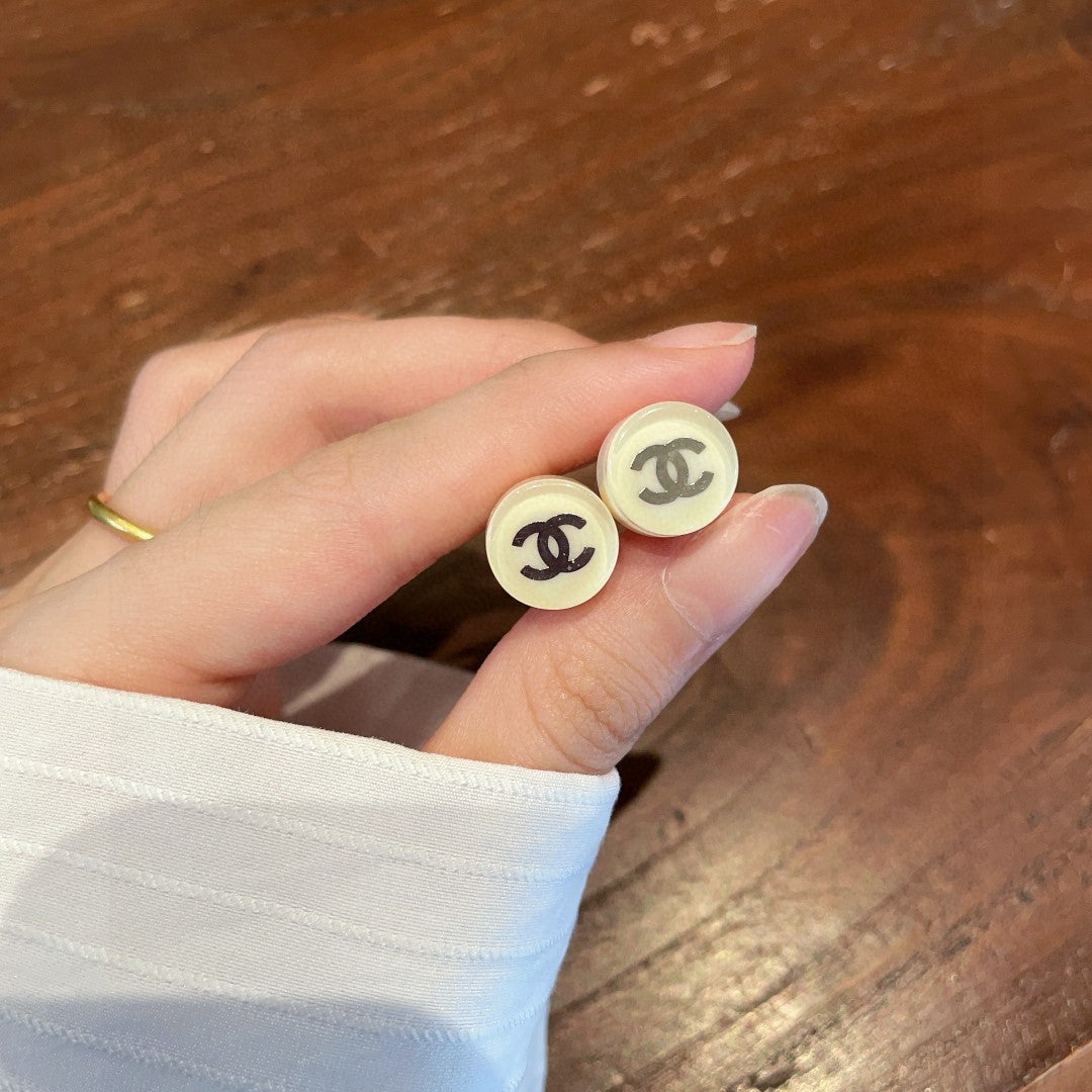 Double-C Emblem Stud Earrings in Polished Metal-Tone – Design 297 side detail