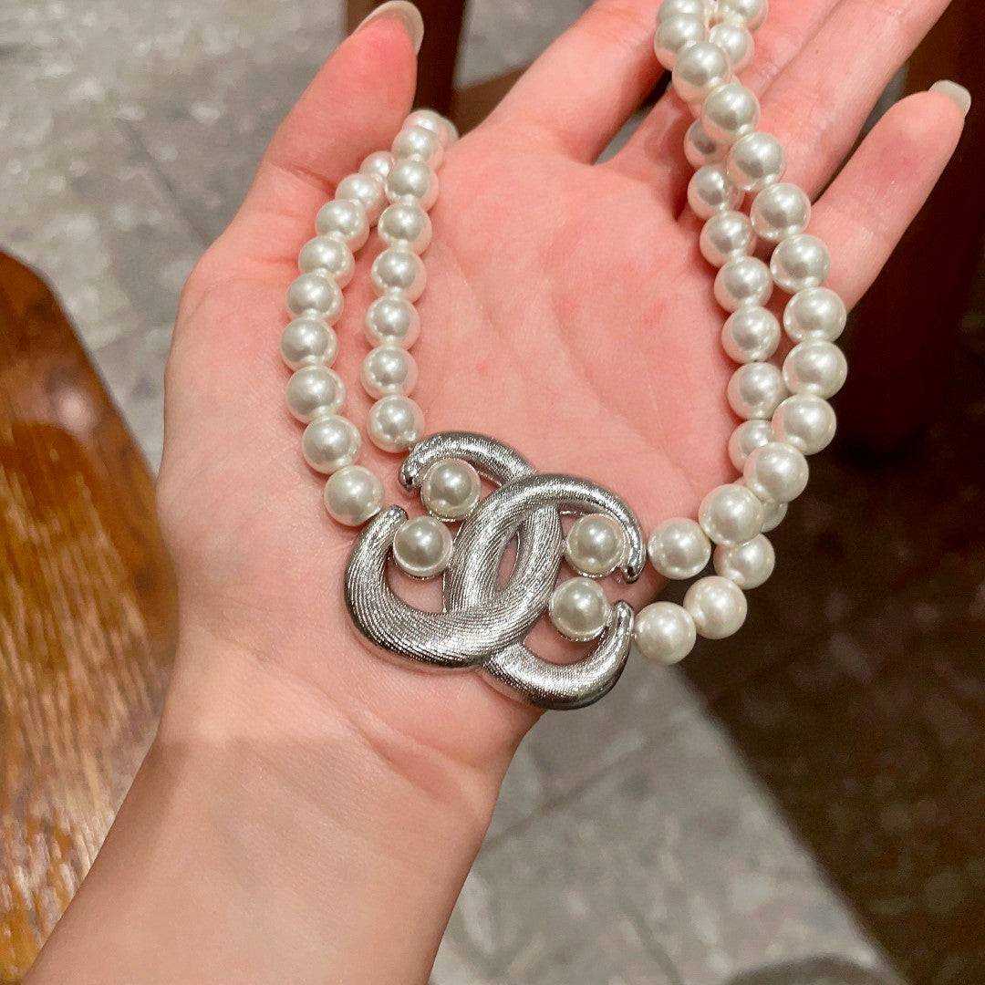Double-C Emblem Pearl-Detail Pendant Necklace – Pearl Detail – Design 075 side detail
