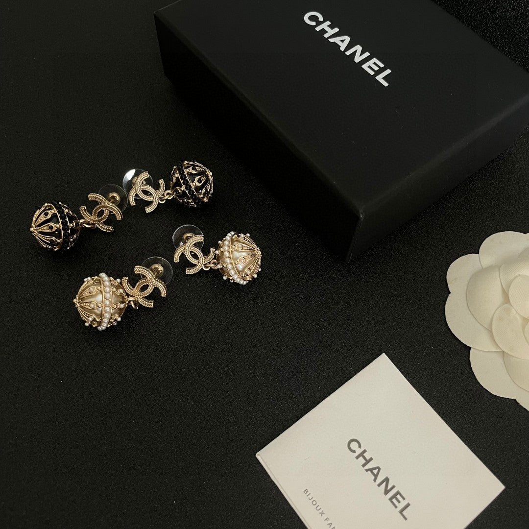 Double-C Emblem Pearl-Detail Stud Earrings – Pearl Detail – Design 013 close-up detail