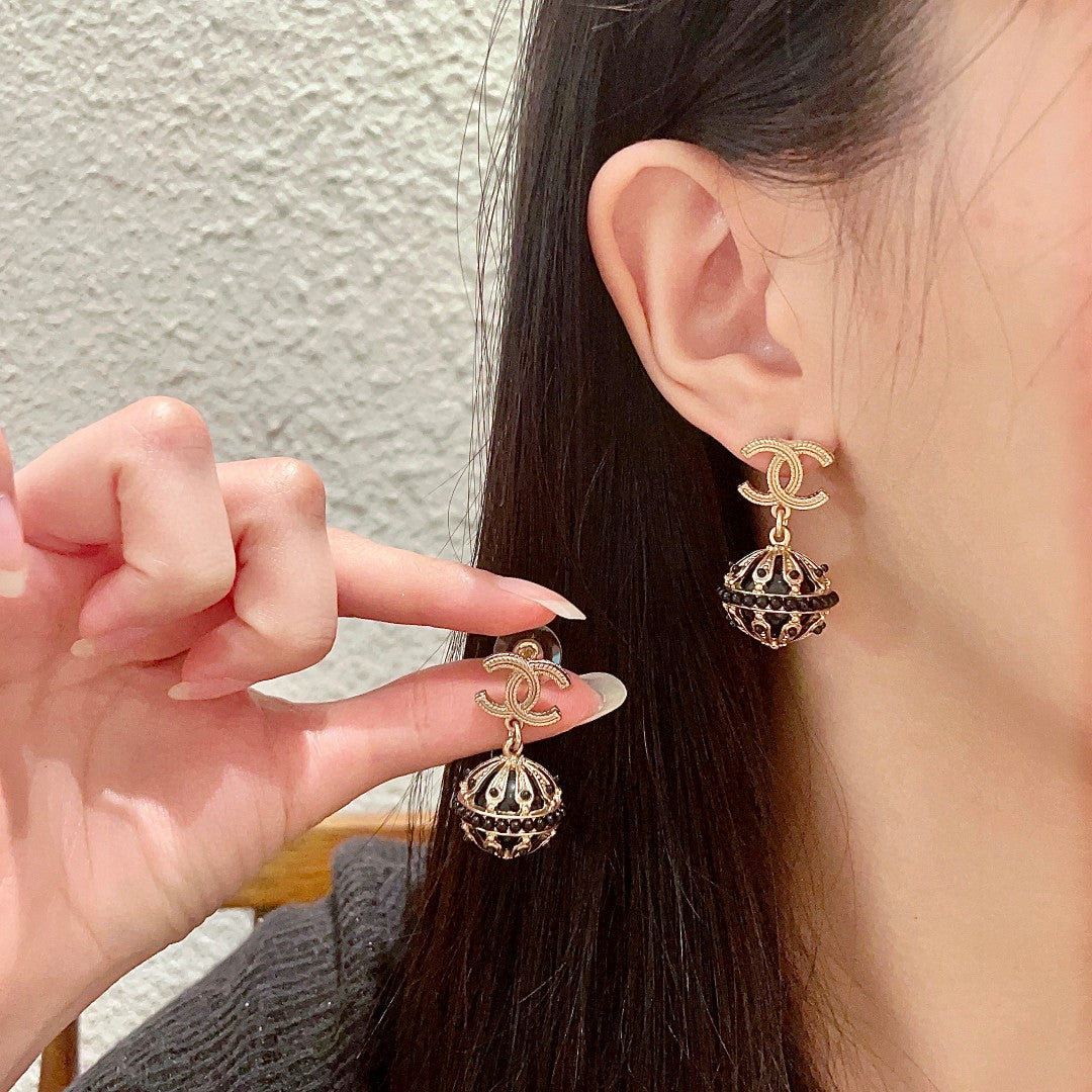 Double-C Emblem Pearl-Detail Stud Earrings – Pearl Detail – Design 013 main product view