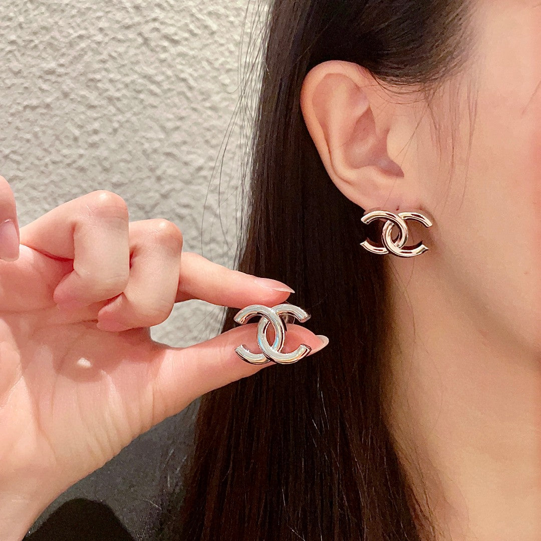 Double-C Emblem Stud Earrings in Polished Metal-Tone – Design 264 main product view