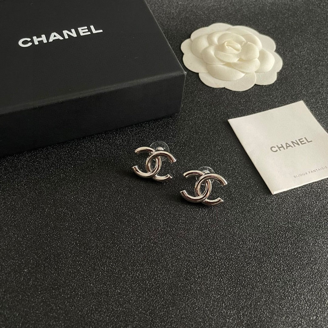 Double-C Emblem Stud Earrings in Polished Metal-Tone – Design 264 styled product view