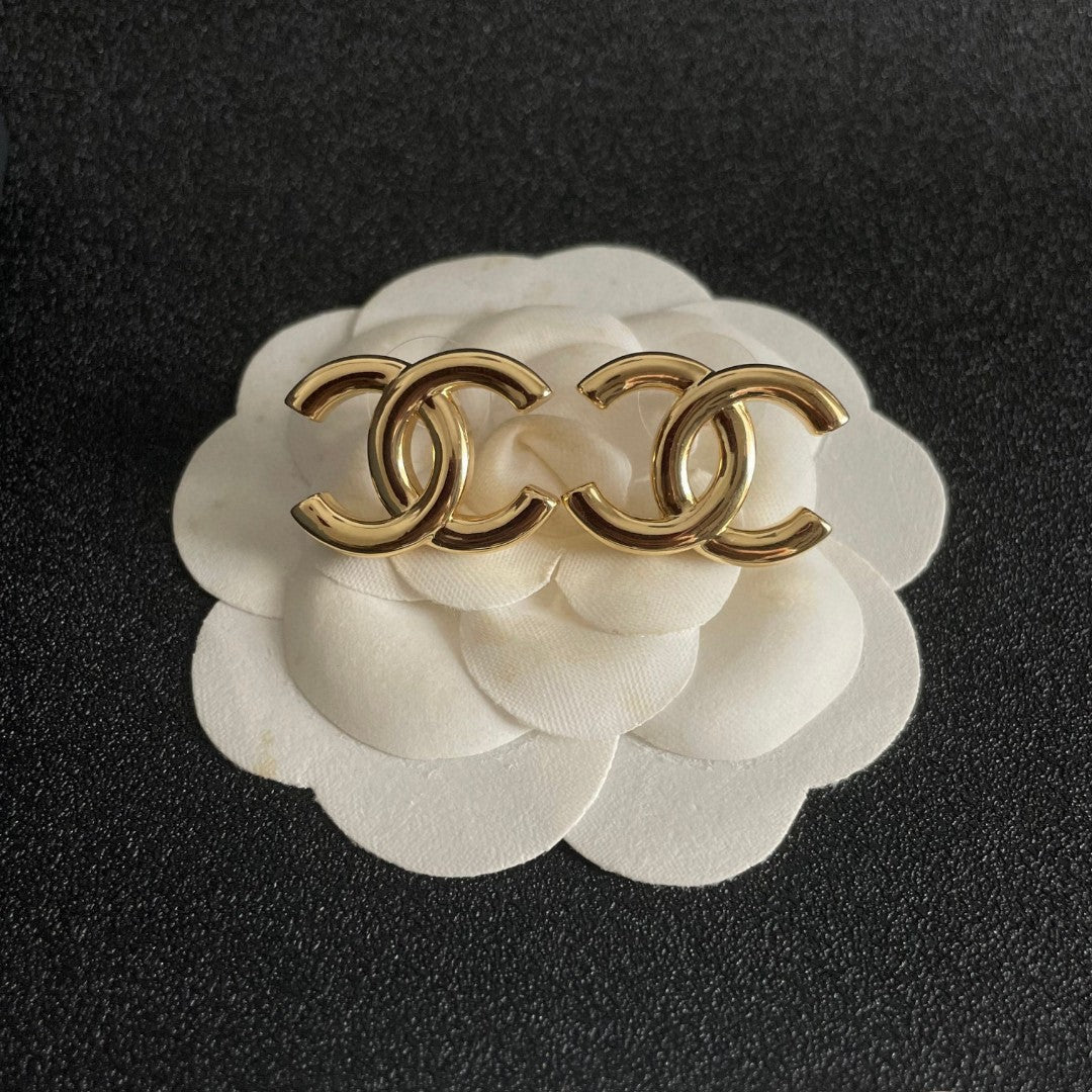Double-C Emblem Stud Earrings in Polished Metal-Tone – Design 263 front product view