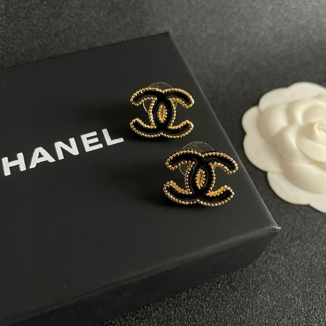 Double-C Emblem Stud Earrings in Polished Metal-Tone – Design 262 detail view