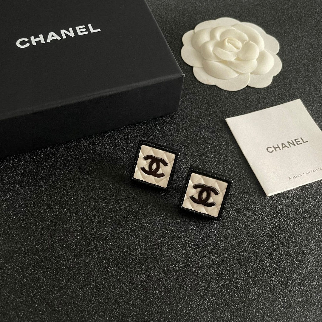 Double-C Emblem Stud Earrings in Polished Metal-Tone – Design 228 styled product view