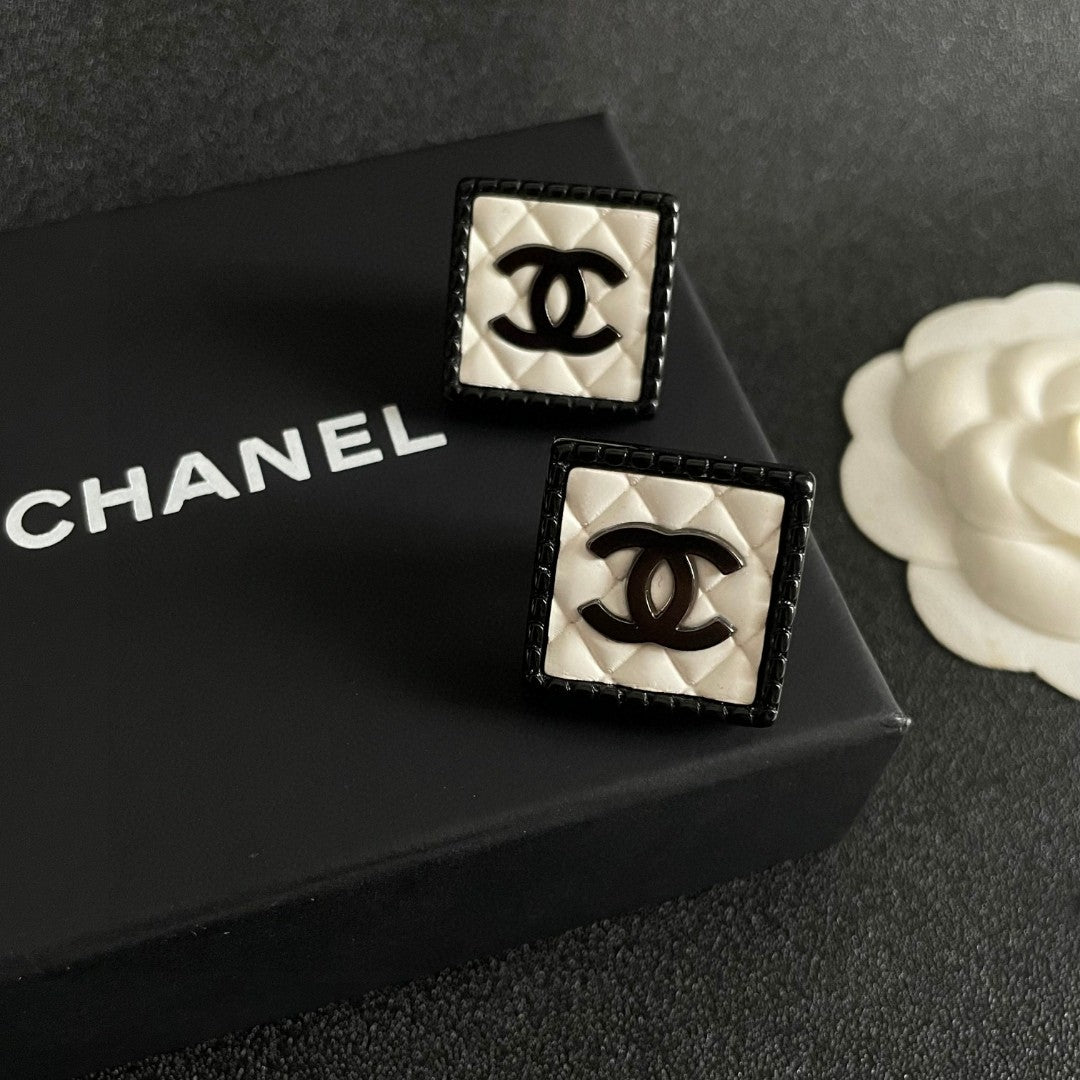 Double-C Emblem Stud Earrings in Polished Metal-Tone – Design 228 detail view