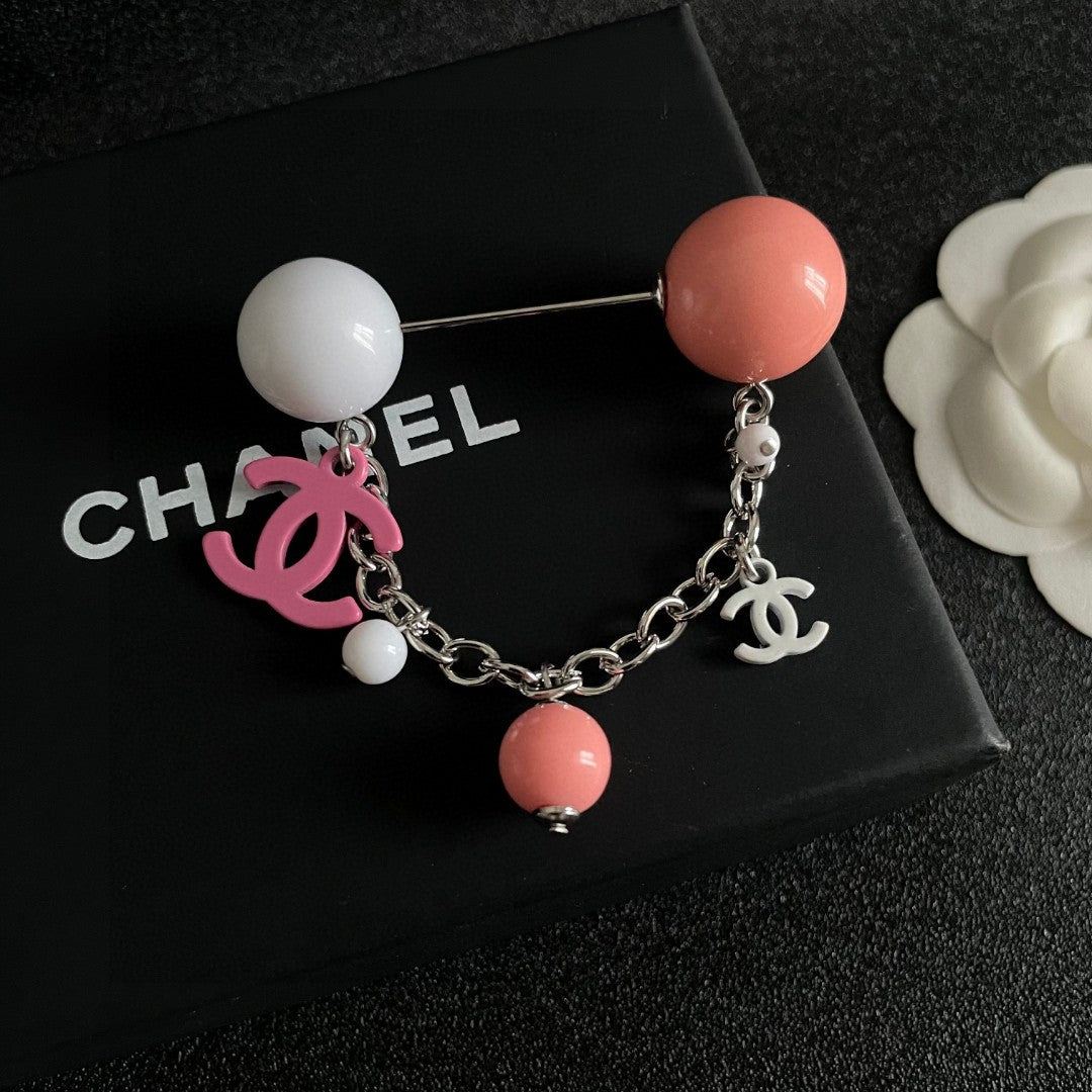 Signature Emblem Brooch in Polished Metal-Tone – Design 023 front product view