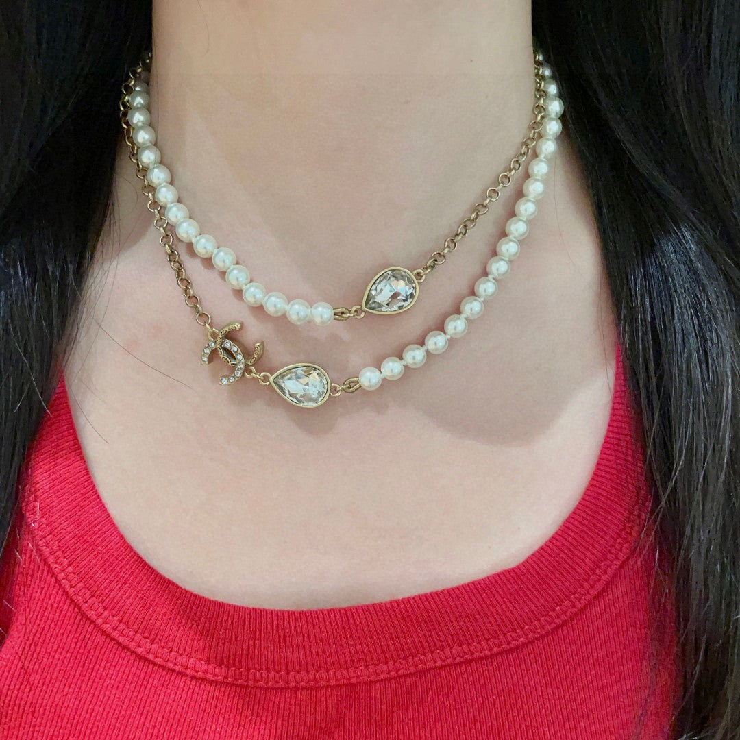 Double-C Emblem Pearl-Detail Pendant Necklace – Pearl Detail – Design 060 detail view