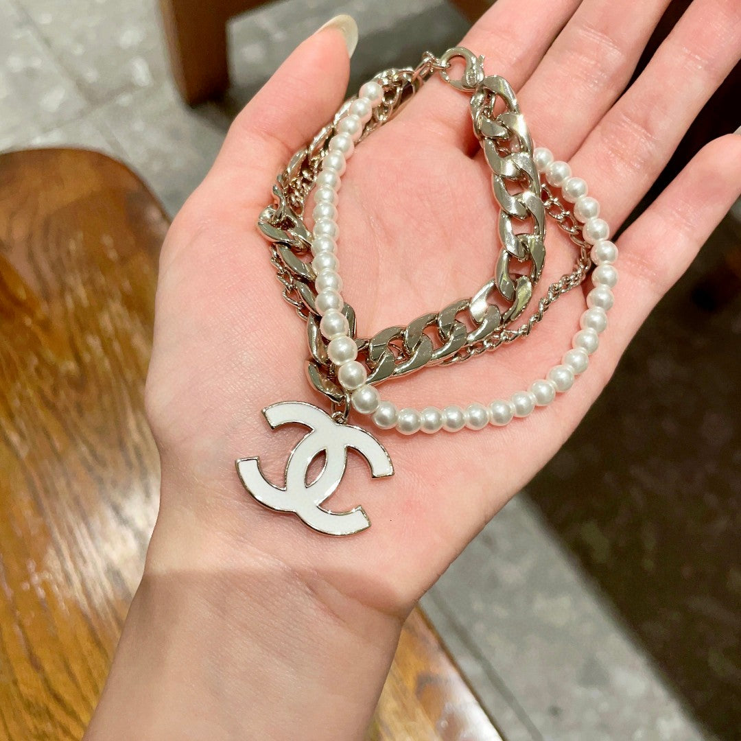 Double-C Emblem Bracelet in Polished Metal-Tone – Design 006 detail view