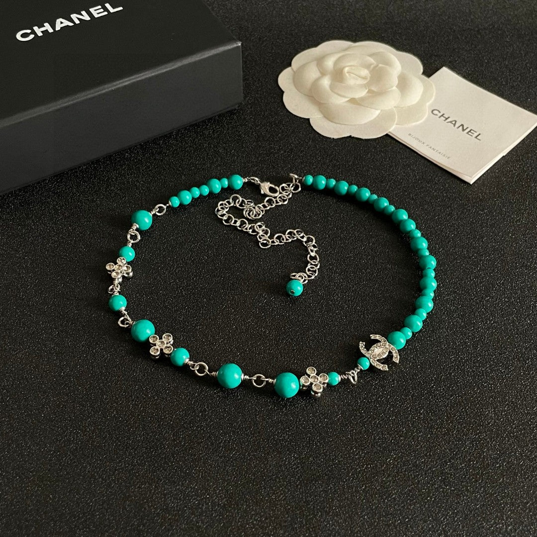 Double-C Emblem Pearl-Detail Pendant Necklace – Pearl Detail – Design 052 detail view
