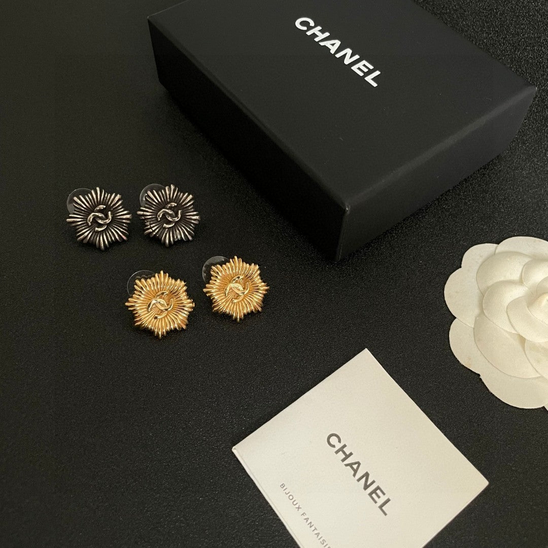 Double-C Emblem Stud Earrings in Polished Metal-Tone – Design 223 close-up detail