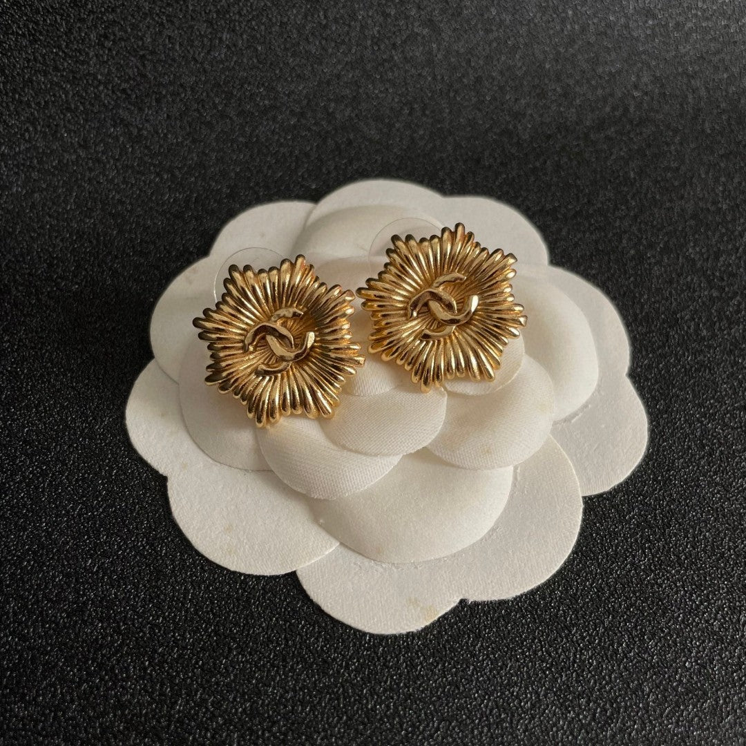 Double-C Emblem Stud Earrings in Polished Metal-Tone – Design 223 front product view