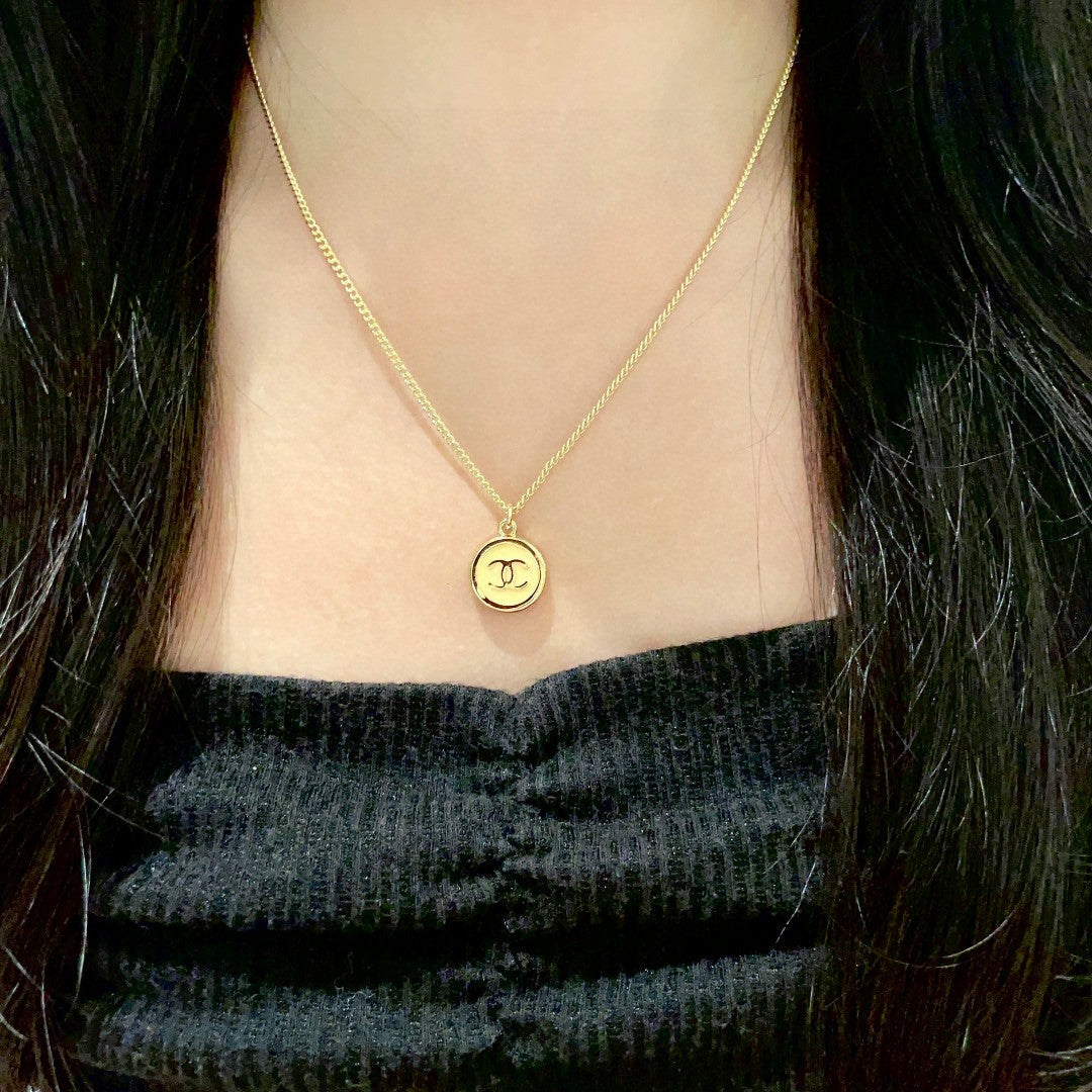 Double-C Emblem Pendant Necklace in Polished Metal-Tone – Design 028 detail view
