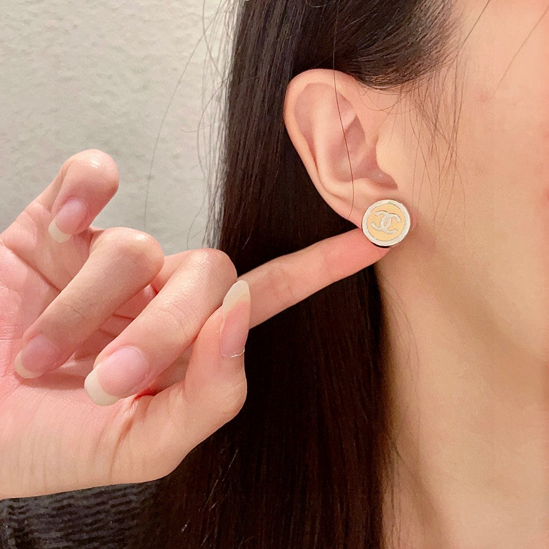 Double-C Emblem Stud Earrings in Polished Metal-Tone – Design 222 front product view