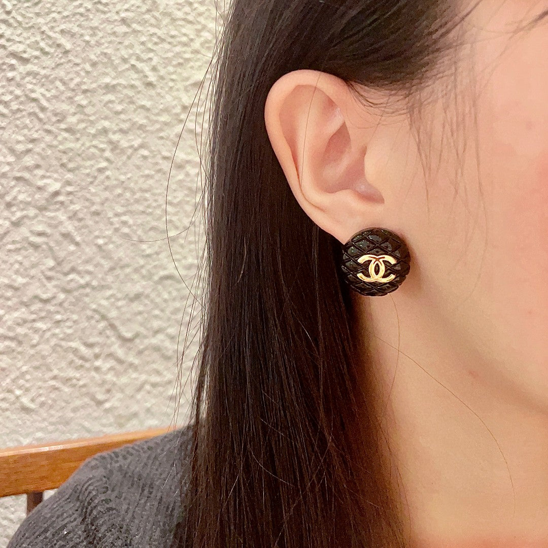 Double-C Emblem Stud Earrings in Polished Metal-Tone – Design 200 detail view