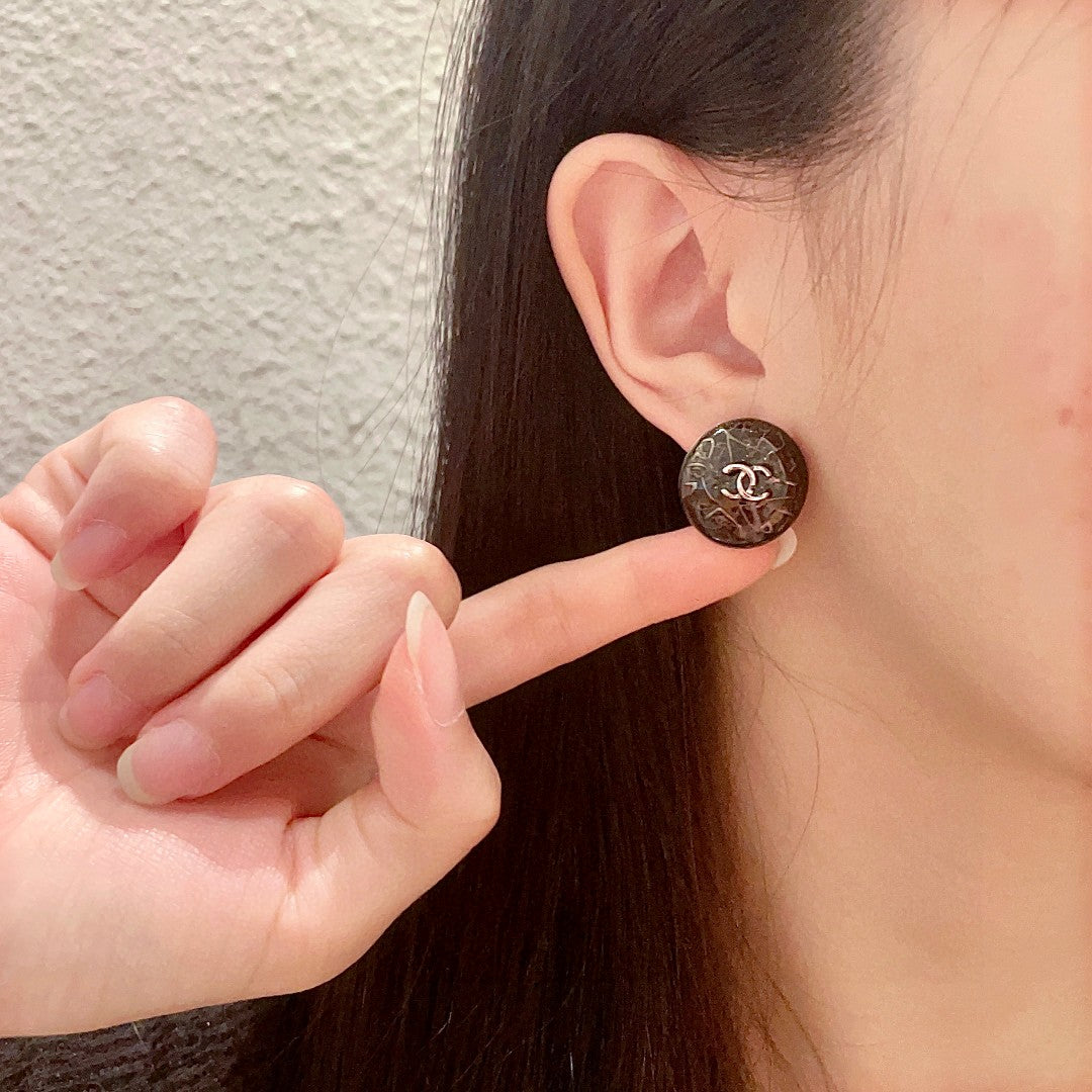 Double-C Emblem Stud Earrings in Polished Metal-Tone – Design 197 front product view