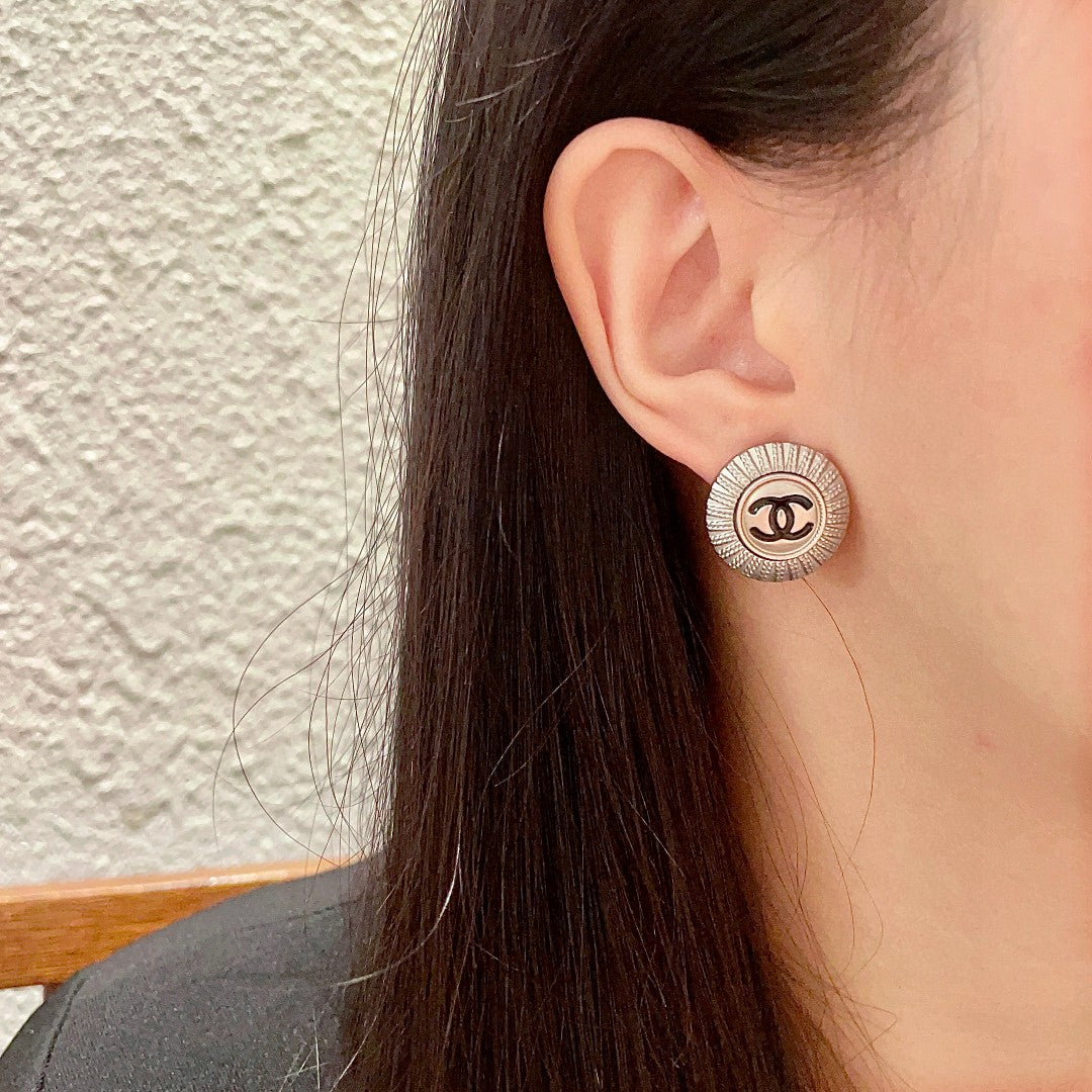Double-C Emblem Stud Earrings in Polished Metal-Tone – Design 196 detail view