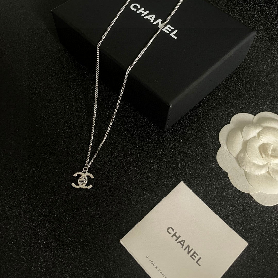Double-C Emblem Pendant Necklace in Polished Metal-Tone – Design 025 close-up detail