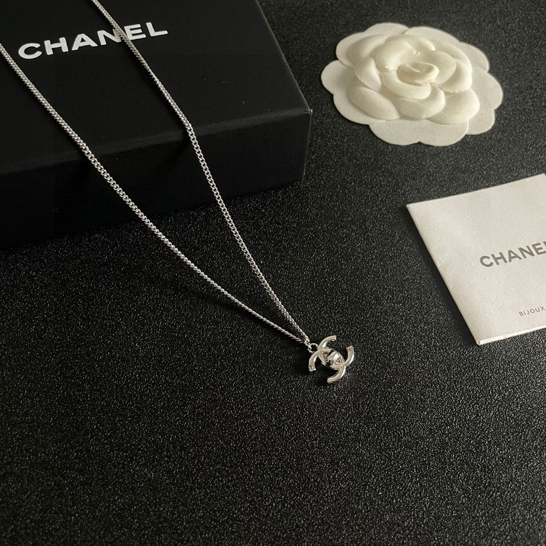 Double-C Emblem Pendant Necklace in Polished Metal-Tone – Design 025 styled product view