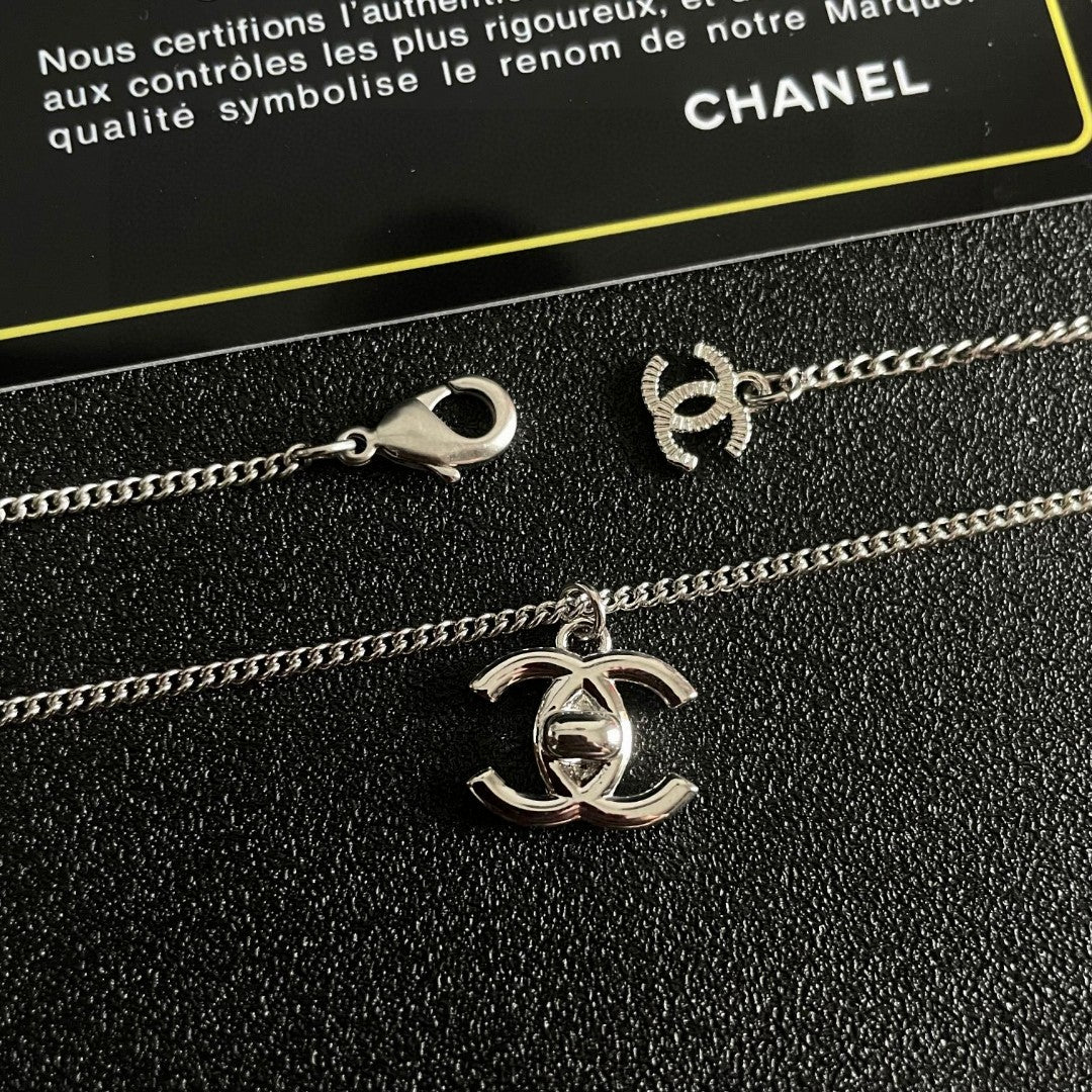 Double-C Emblem Pendant Necklace in Polished Metal-Tone – Design 025 main product view