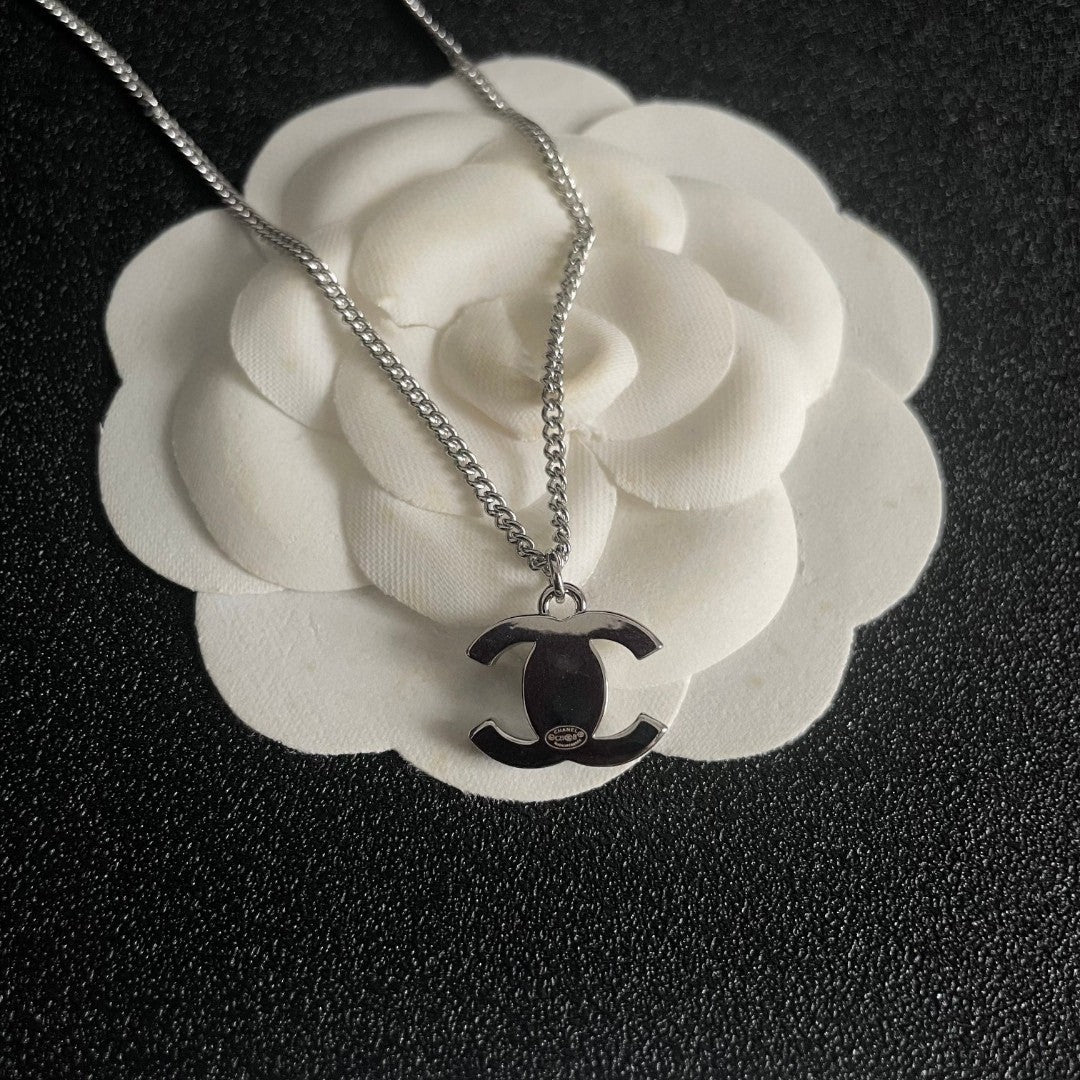 Double-C Emblem Pendant Necklace in Polished Metal-Tone – Design 025 front product view