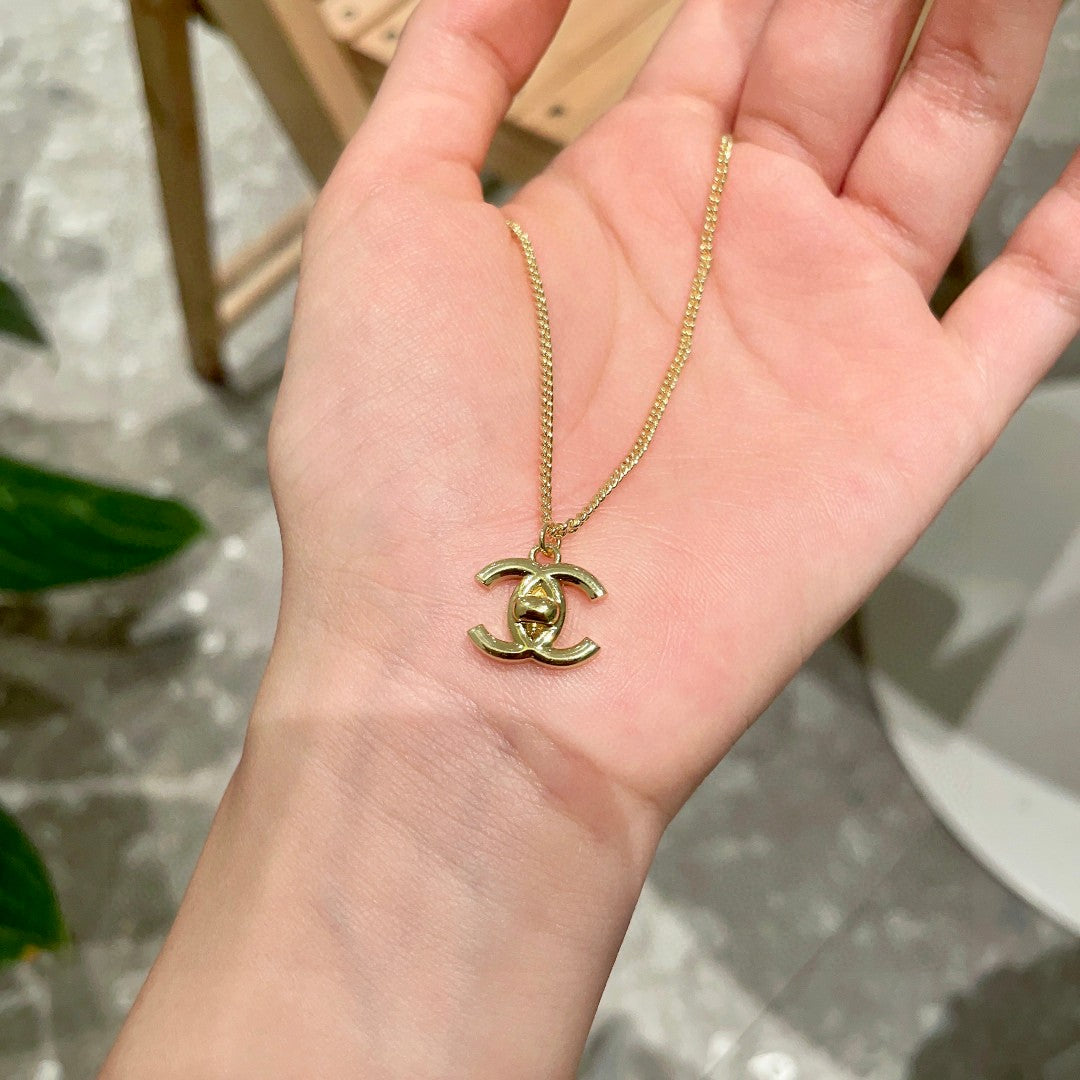 Double-C Emblem Pendant Necklace in Polished Metal-Tone – Design 024 side detail