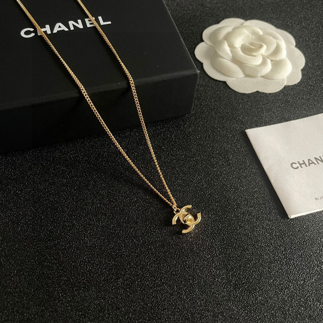 Double-C Emblem Pendant Necklace in Polished Metal-Tone – Design 024 styled product view
