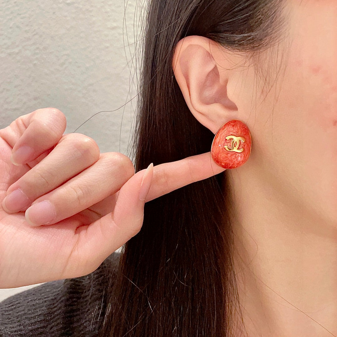 Double-C Emblem Stud Earrings in Polished Metal-Tone – Design 194 front product view