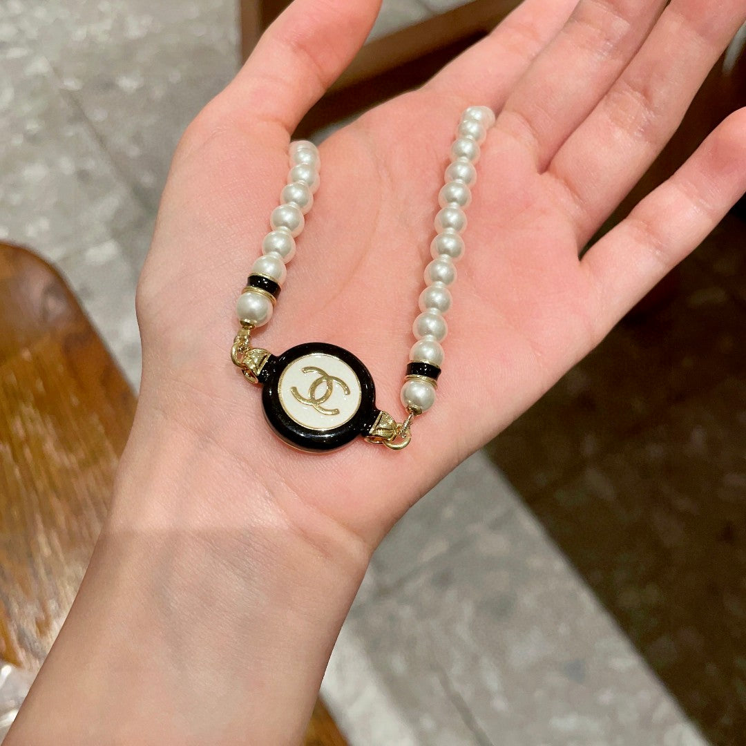 Double-C Emblem Pearl-Detail Pendant Necklace – Pearl Detail – Design 046 side detail