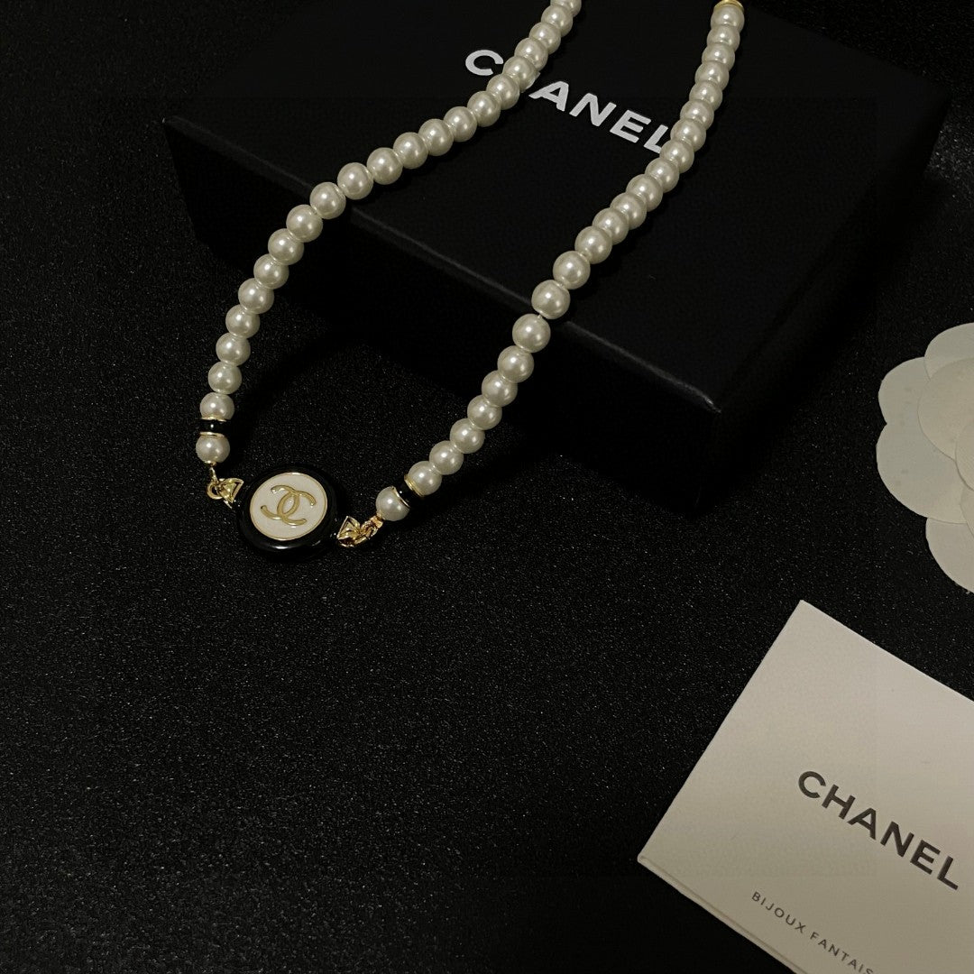 Double-C Emblem Pearl-Detail Pendant Necklace – Pearl Detail – Design 046 close-up detail
