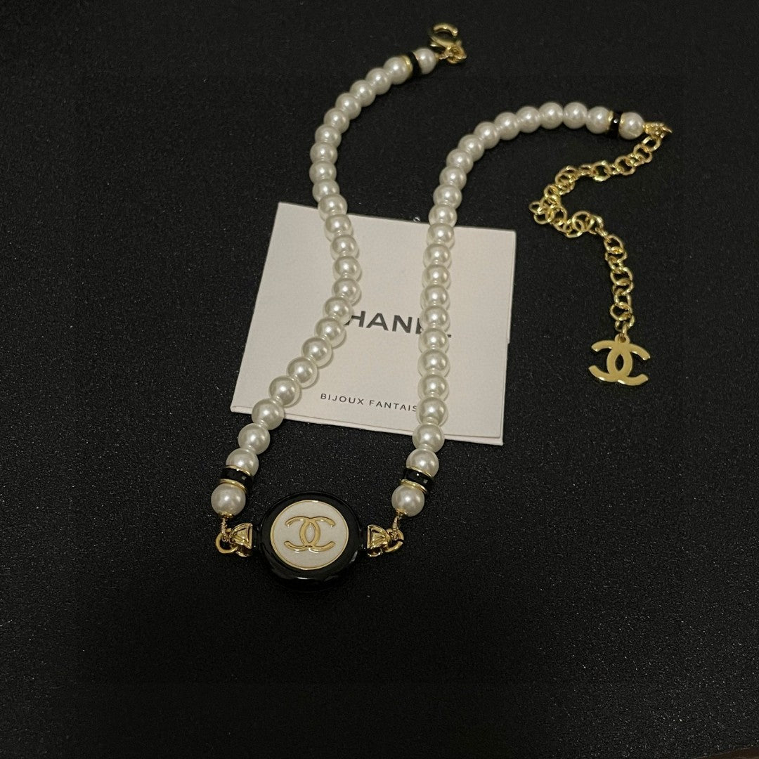 Double-C Emblem Pearl-Detail Pendant Necklace – Pearl Detail – Design 046 detail view