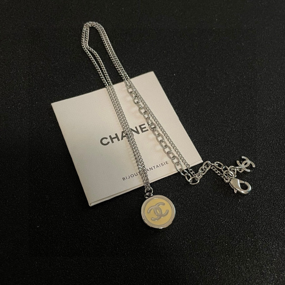 Double-C Emblem Pendant Necklace in Polished Metal-Tone – Design 019 close-up detail