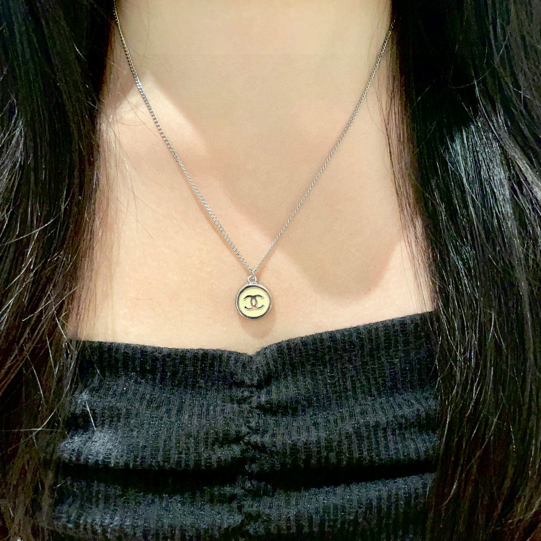Double-C Emblem Pendant Necklace in Polished Metal-Tone – Design 019 detail view