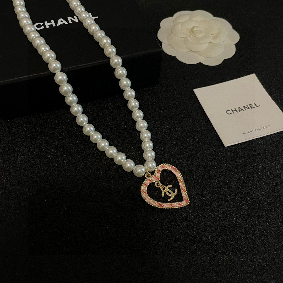 Double-C Emblem Pearl-Detail Pendant Necklace – Pearl Detail – Design 044 styled product view