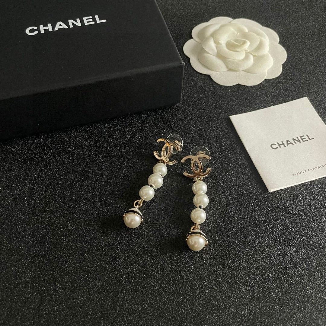 Double-C Emblem Pearl-Detail Statement Earrings – Pearl Detail – Design 011 styled product view